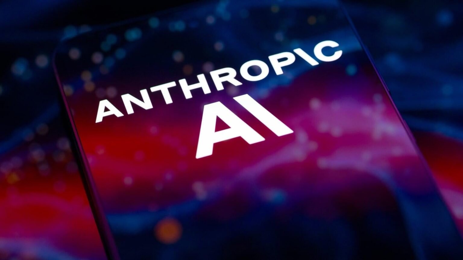Anthropic AI logo on a smartphone with blue and purple futuristic background