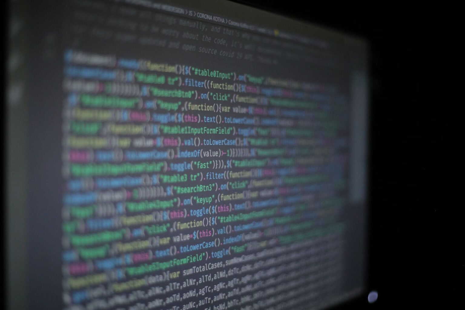 Fugu Ultra v1.1 : le routeur IA de Sakana qui affirme battre Fable 5 Code de programmation colore affiche sur un ecran, illustrant le routage de modeles IA